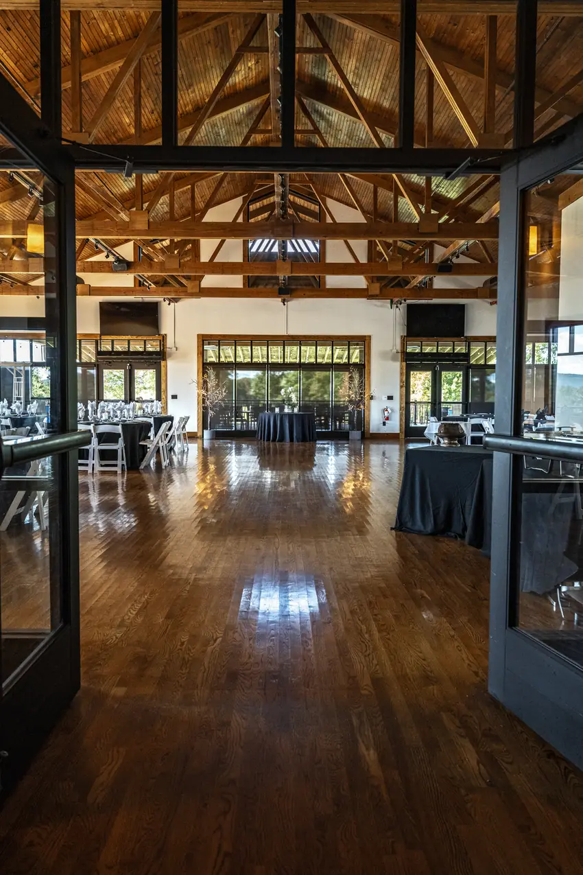 Entrance into the 6,000 sq ft banquet room with vaulted wood ceilings and exposed timber beams